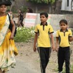 parents-go-to-school-for-their-son-at-surat.jpg